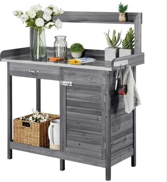 Mesa de cultivo con pequeño armario gris completo para cultivar en casa